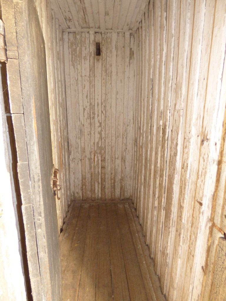 Close the door and this solitary confinement cell is pitch black